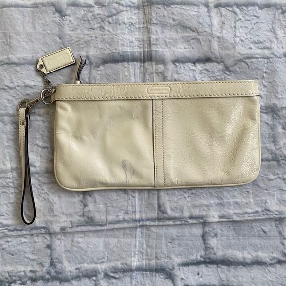 Coach Handbags - Coach wristlet zipper close clutch purse white 10.5”x5.5”